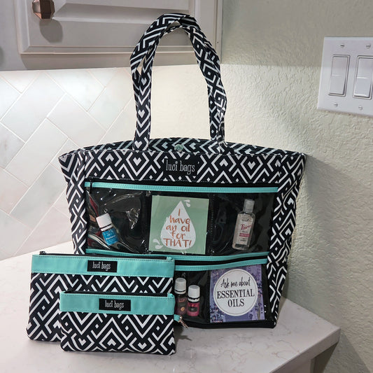 Black and white art deco display tote bag with coordinating accessories.